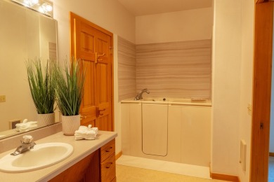 This spacious single level home, nestled on the 14th Fairway of on Eagle Crest Golf Resort - Resort Course in Oregon - for sale on GolfHomes.com, golf home, golf lot