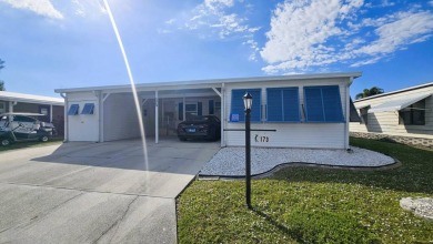 Welcome to your Florida dream lifestyle in the serene GOLF on Blue Heron Pines Golf Course in Florida - for sale on GolfHomes.com, golf home, golf lot