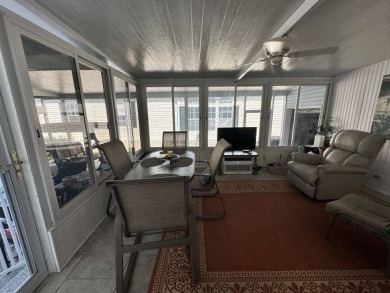 This partially furnished residence has so much to offer! on Four Lakes Golf Club in Florida - for sale on GolfHomes.com, golf home, golf lot