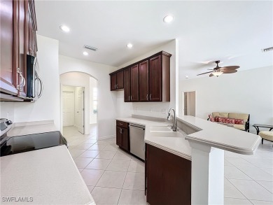 THIRTEEN-YEAR-YOUNG Sandpiper model home is fresh, clean, bright on Herons Glen Golf and Country Club in Florida - for sale on GolfHomes.com, golf home, golf lot