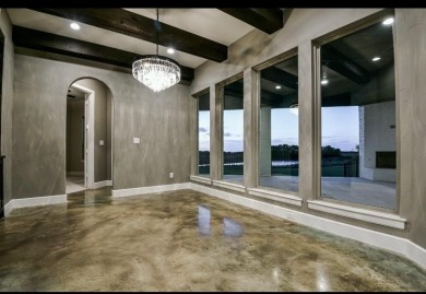 This is a unique custom home in Heath Golf And Yacht on an on Heath Golf and Yacht Club in Texas - for sale on GolfHomes.com, golf home, golf lot