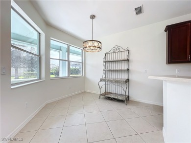 THIRTEEN-YEAR-YOUNG Sandpiper model home is fresh, clean, bright on Herons Glen Golf and Country Club in Florida - for sale on GolfHomes.com, golf home, golf lot