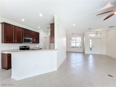THIRTEEN-YEAR-YOUNG Sandpiper model home is fresh, clean, bright on Herons Glen Golf and Country Club in Florida - for sale on GolfHomes.com, golf home, golf lot