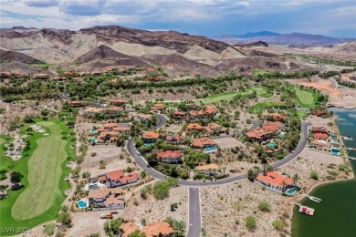Oversized dock with HydroHoist boat lift and a 21' twin-screw on South Shore At Lake Las Vegas in Nevada - for sale on GolfHomes.com, golf home, golf lot