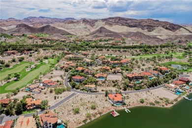 Oversized dock with HydroHoist boat lift and a 21' twin-screw on South Shore At Lake Las Vegas in Nevada - for sale on GolfHomes.com, golf home, golf lot