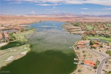 Oversized dock with HydroHoist boat lift and a 21' twin-screw on South Shore At Lake Las Vegas in Nevada - for sale on GolfHomes.com, golf home, golf lot