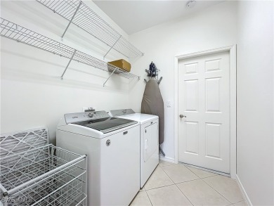 THIRTEEN-YEAR-YOUNG Sandpiper model home is fresh, clean, bright on Herons Glen Golf and Country Club in Florida - for sale on GolfHomes.com, golf home, golf lot