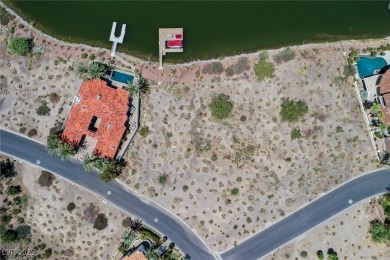 Oversized dock with HydroHoist boat lift and a 21' twin-screw on South Shore At Lake Las Vegas in Nevada - for sale on GolfHomes.com, golf home, golf lot