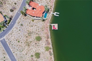 Oversized dock with HydroHoist boat lift and a 21' twin-screw on South Shore At Lake Las Vegas in Nevada - for sale on GolfHomes.com, golf home, golf lot