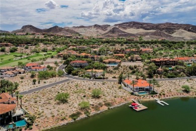 Oversized dock with HydroHoist boat lift and a 21' twin-screw on South Shore At Lake Las Vegas in Nevada - for sale on GolfHomes.com, golf home, golf lot