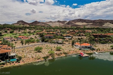 Oversized dock with HydroHoist boat lift and a 21' twin-screw on South Shore At Lake Las Vegas in Nevada - for sale on GolfHomes.com, golf home, golf lot