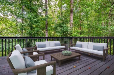 Welcome to Windward! From the inviting front porch, perfect for on The Golf Club of Georgia in Georgia - for sale on GolfHomes.com, golf home, golf lot