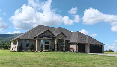 This stunning 4-bedroom, 2.5 bath home is perfectly situated on on Wolf Ridge Golf Course in Oklahoma - for sale on GolfHomes.com, golf home, golf lot
