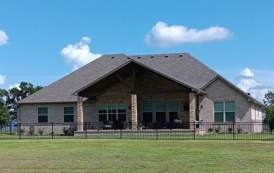 This stunning 4-bedroom, 2.5 bath home is perfectly situated on on Wolf Ridge Golf Course in Oklahoma - for sale on GolfHomes.com, golf home, golf lot