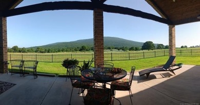 This stunning 4-bedroom, 2.5 bath home is perfectly situated on on Wolf Ridge Golf Course in Oklahoma - for sale on GolfHomes.com, golf home, golf lot