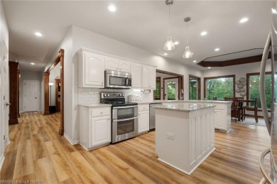 Welcome to 3525 Golf Course Drive, where timeless design meets on Eagle Crest Golf Course in Arkansas - for sale on GolfHomes.com, golf home, golf lot