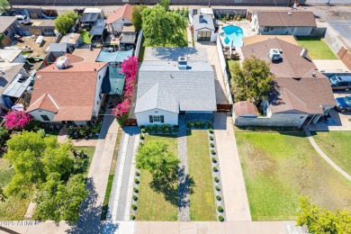 Live steps to 222-acre Encanto Park with two golf courses, a 7 on Encanto 18 Golf Course in Arizona - for sale on GolfHomes.com, golf home, golf lot
