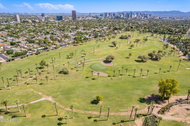 Live steps to 222-acre Encanto Park with two golf courses, a 7 on Encanto 18 Golf Course in Arizona - for sale on GolfHomes.com, golf home, golf lot