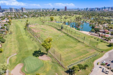 Live steps to 222-acre Encanto Park with two golf courses, a 7 on Encanto 18 Golf Course in Arizona - for sale on GolfHomes.com, golf home, golf lot