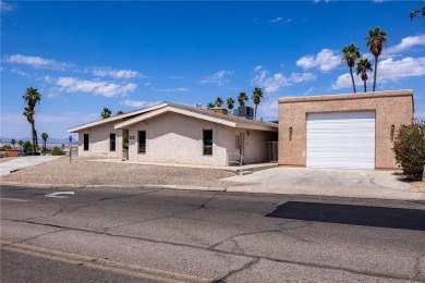 Welcome to 2475 Saratoga located on a premium corner lot, this on London Bridge Golf Course in Arizona - for sale on GolfHomes.com, golf home, golf lot