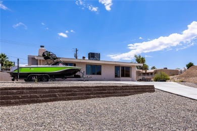 Welcome to 2475 Saratoga located on a premium corner lot, this on London Bridge Golf Course in Arizona - for sale on GolfHomes.com, golf home, golf lot