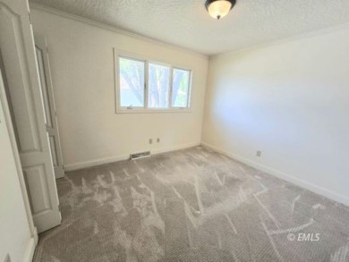 Nestled in the Country Club Estates, this charming ranch-style on Miles City Town and Country Club in Montana - for sale on GolfHomes.com, golf home, golf lot