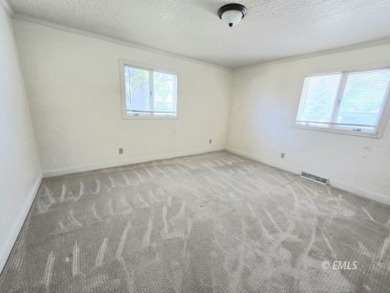 Nestled in the Country Club Estates, this charming ranch-style on Miles City Town and Country Club in Montana - for sale on GolfHomes.com, golf home, golf lot
