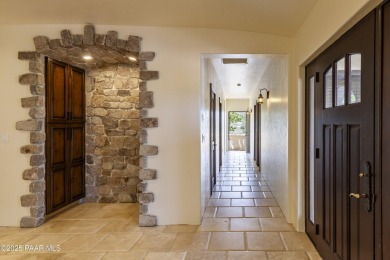 Discover a rare fusion of old-world elegance & cutting-edge on StoneRidge Golf Course in Arizona - for sale on GolfHomes.com, golf home, golf lot