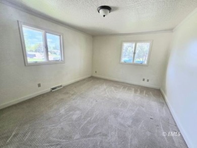 Nestled in the Country Club Estates, this charming ranch-style on Miles City Town and Country Club in Montana - for sale on GolfHomes.com, golf home, golf lot