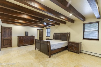 Discover a rare fusion of old-world elegance & cutting-edge on StoneRidge Golf Course in Arizona - for sale on GolfHomes.com, golf home, golf lot