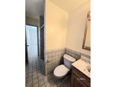 Nestled in the Country Club Estates, this charming ranch-style on Miles City Town and Country Club in Montana - for sale on GolfHomes.com, golf home, golf lot