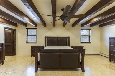 Discover a rare fusion of old-world elegance & cutting-edge on StoneRidge Golf Course in Arizona - for sale on GolfHomes.com, golf home, golf lot