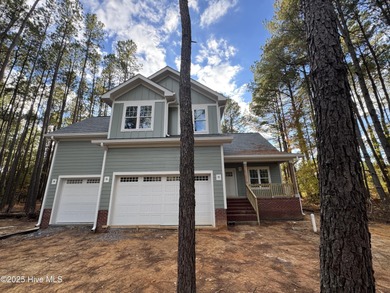 Welcome to your dream home, a stunning new construction by local on Woodlake Country Club in North Carolina - for sale on GolfHomes.com, golf home, golf lot