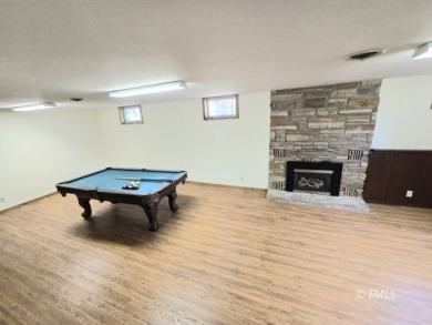 Nestled in the Country Club Estates, this charming ranch-style on Miles City Town and Country Club in Montana - for sale on GolfHomes.com, golf home, golf lot