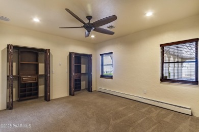 Discover a rare fusion of old-world elegance & cutting-edge on StoneRidge Golf Course in Arizona - for sale on GolfHomes.com, golf home, golf lot