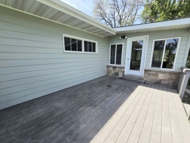 Nestled in the Country Club Estates, this charming ranch-style on Miles City Town and Country Club in Montana - for sale on GolfHomes.com, golf home, golf lot