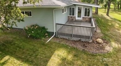 Nestled in the Country Club Estates, this charming ranch-style on Miles City Town and Country Club in Montana - for sale on GolfHomes.com, golf home, golf lot