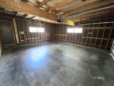 Nestled in the Country Club Estates, this charming ranch-style on Miles City Town and Country Club in Montana - for sale on GolfHomes.com, golf home, golf lot