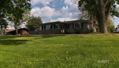 Nestled in the Country Club Estates, this charming ranch-style on Miles City Town and Country Club in Montana - for sale on GolfHomes.com, golf home, golf lot