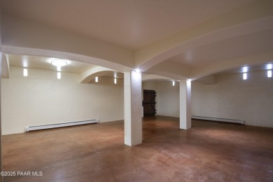 Discover a rare fusion of old-world elegance & cutting-edge on StoneRidge Golf Course in Arizona - for sale on GolfHomes.com, golf home, golf lot