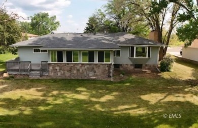 Nestled in the Country Club Estates, this charming ranch-style on Miles City Town and Country Club in Montana - for sale on GolfHomes.com, golf home, golf lot