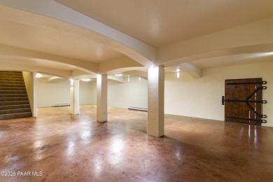 Discover a rare fusion of old-world elegance & cutting-edge on StoneRidge Golf Course in Arizona - for sale on GolfHomes.com, golf home, golf lot