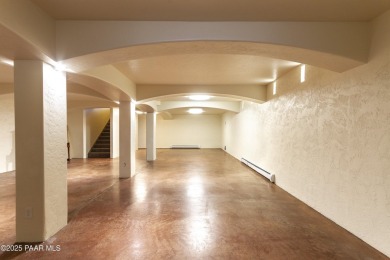 Discover a rare fusion of old-world elegance & cutting-edge on StoneRidge Golf Course in Arizona - for sale on GolfHomes.com, golf home, golf lot