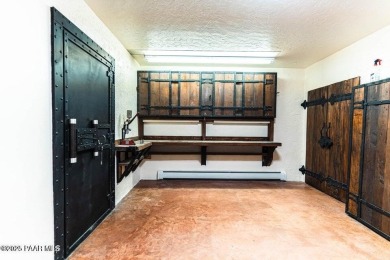 Discover a rare fusion of old-world elegance & cutting-edge on StoneRidge Golf Course in Arizona - for sale on GolfHomes.com, golf home, golf lot