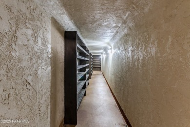 Discover a rare fusion of old-world elegance & cutting-edge on StoneRidge Golf Course in Arizona - for sale on GolfHomes.com, golf home, golf lot