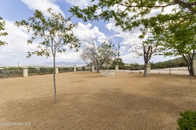 Discover a rare fusion of old-world elegance & cutting-edge on StoneRidge Golf Course in Arizona - for sale on GolfHomes.com, golf home, golf lot