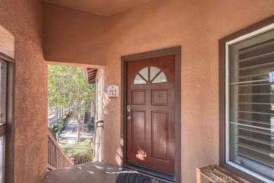 Welcome to this exquisite two-bedroom upstairs, end-unit in the on Tustin Ranch Golf Club in California - for sale on GolfHomes.com, golf home, golf lot