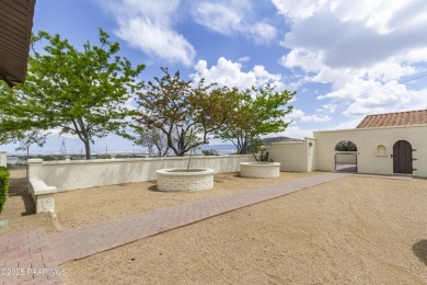 Discover a rare fusion of old-world elegance & cutting-edge on StoneRidge Golf Course in Arizona - for sale on GolfHomes.com, golf home, golf lot
