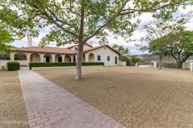Discover a rare fusion of old-world elegance & cutting-edge on StoneRidge Golf Course in Arizona - for sale on GolfHomes.com, golf home, golf lot