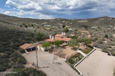 Discover a rare fusion of old-world elegance & cutting-edge on StoneRidge Golf Course in Arizona - for sale on GolfHomes.com, golf home, golf lot